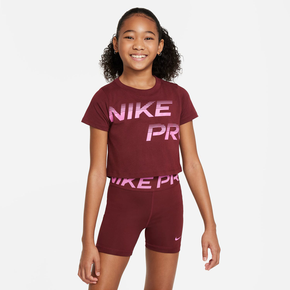 Nike Dri-Fit Essential Cropped Camiseta de manga corta Chicas - rojo oscuro, rosa